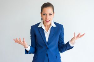 shocked-business-woman-with-questioning-face-spreading-hands_1262-12484